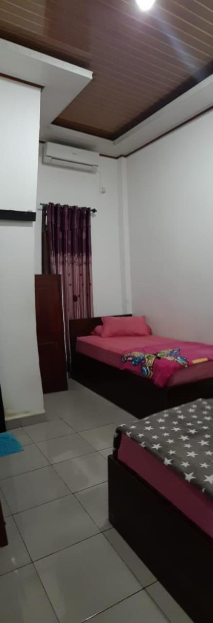 Losmen Ibu Hj. Tarjo Palembang Phòng bức ảnh